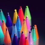 A photo of the tips of coloured pencils